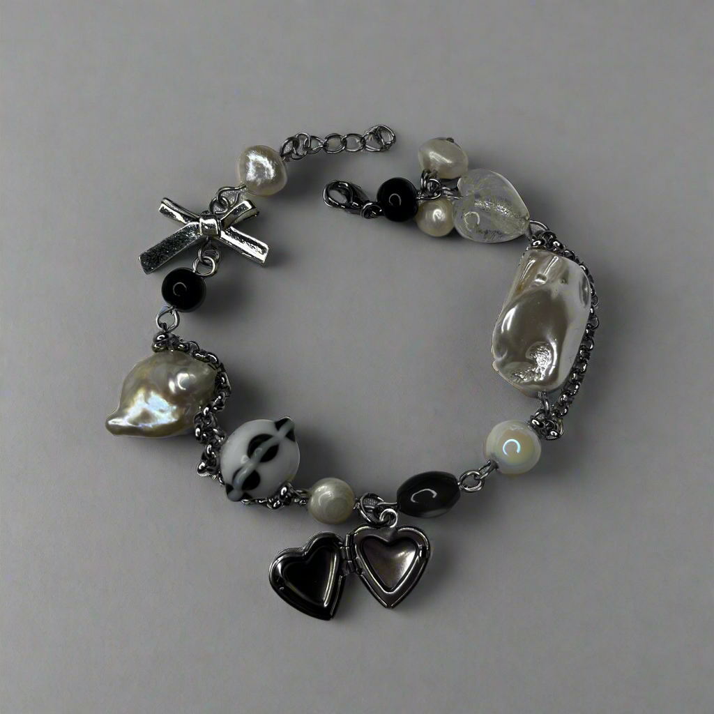 “Memoir” heart locket bracelet